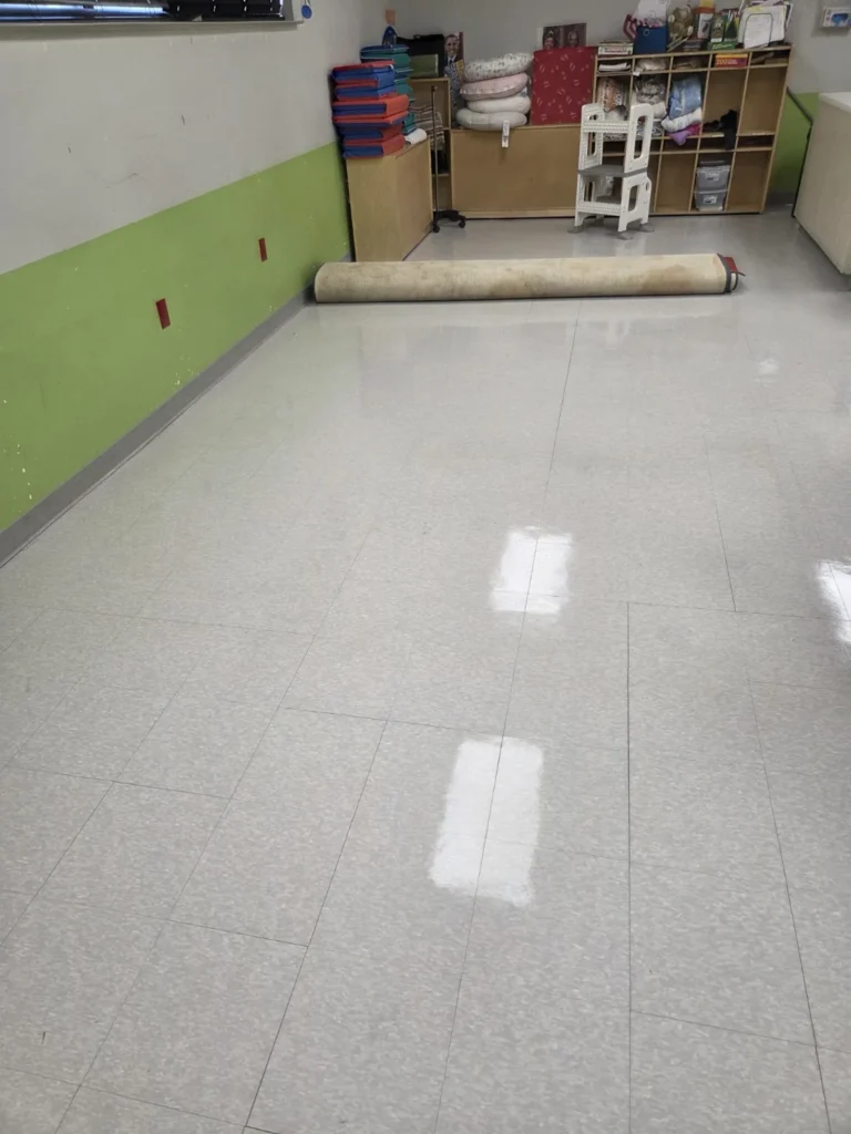 Daycare classroom vinyl tile floor with a high-gloss finish after stripping and waxing by Divine Cleaning and Janitorial